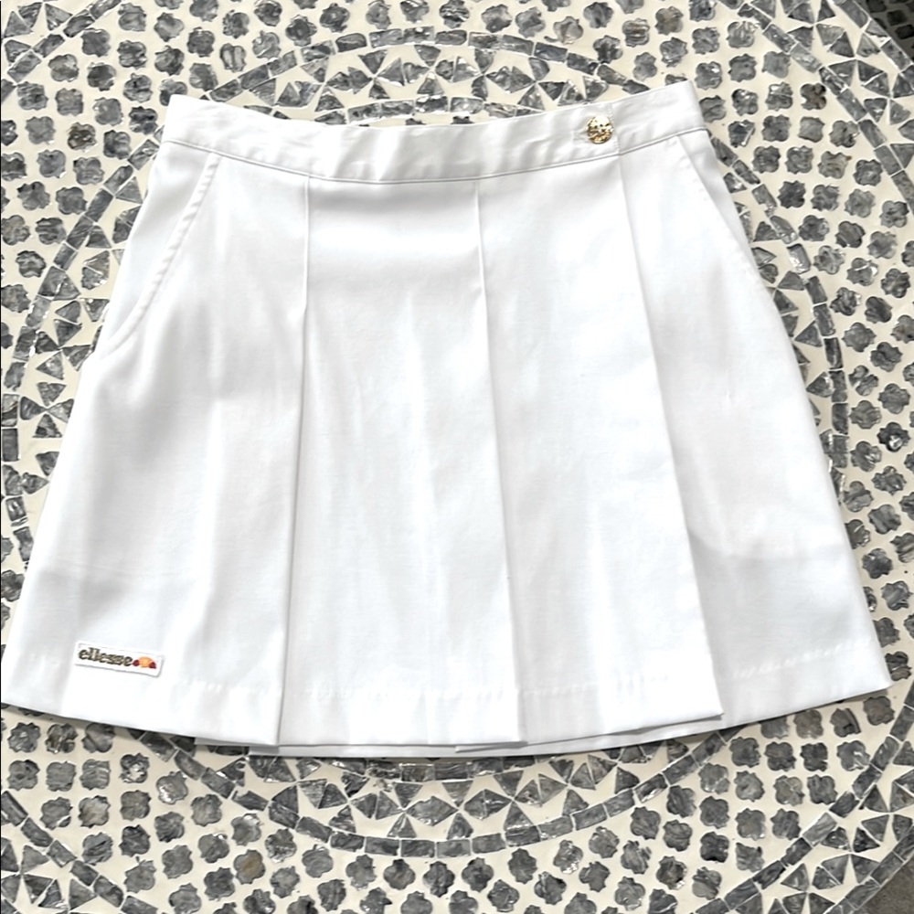Ellesse White Skater Mini Skirt with Pleats Button Front Closure